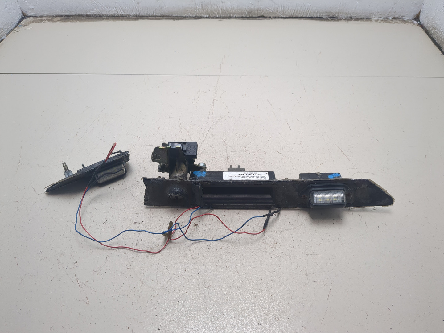 Фонарь подсветки номера