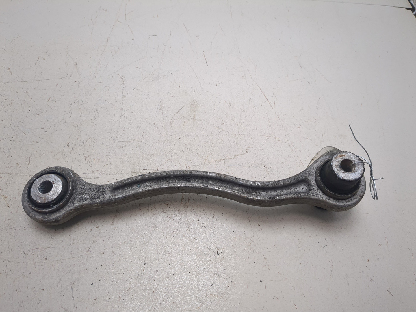 Рычаг задний левый