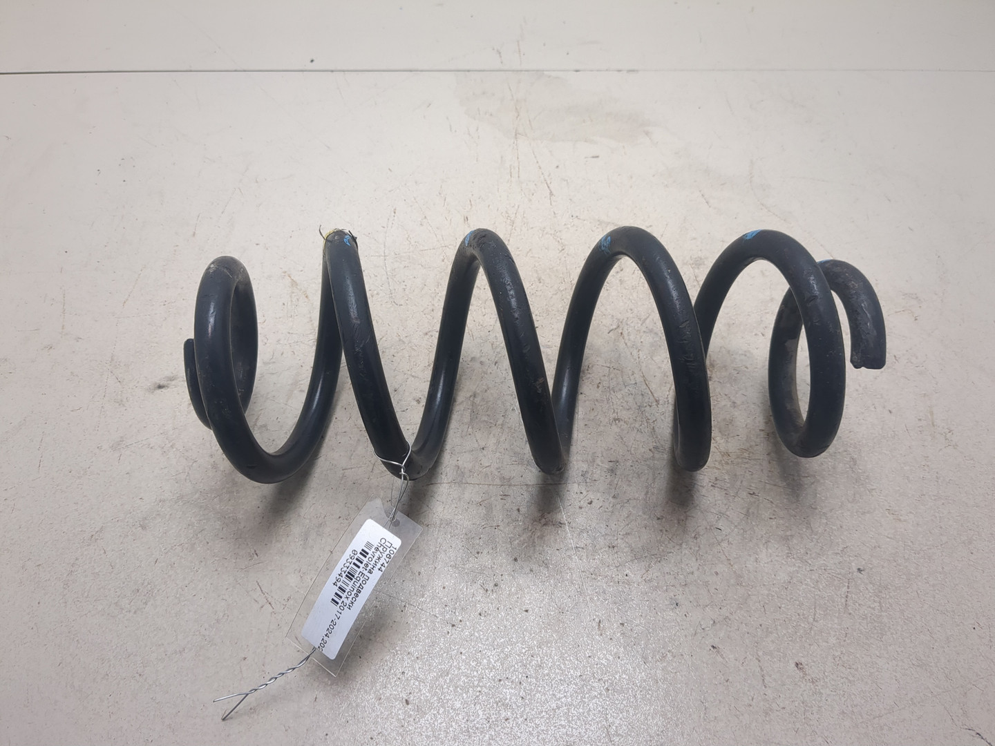 Пружина задняя