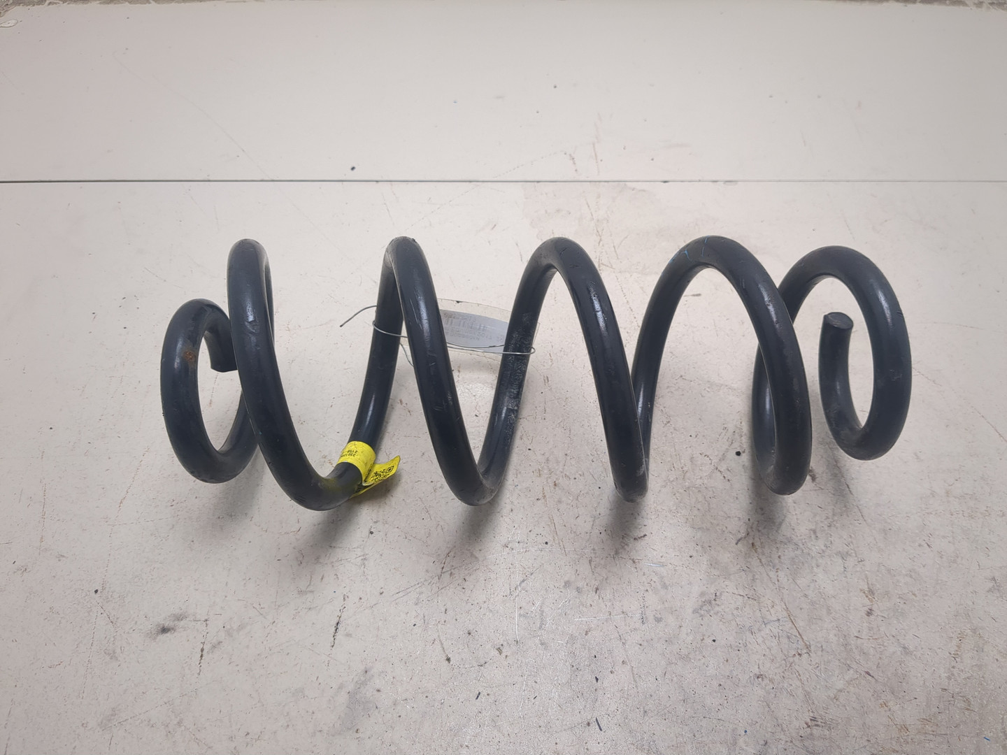 Пружина задняя