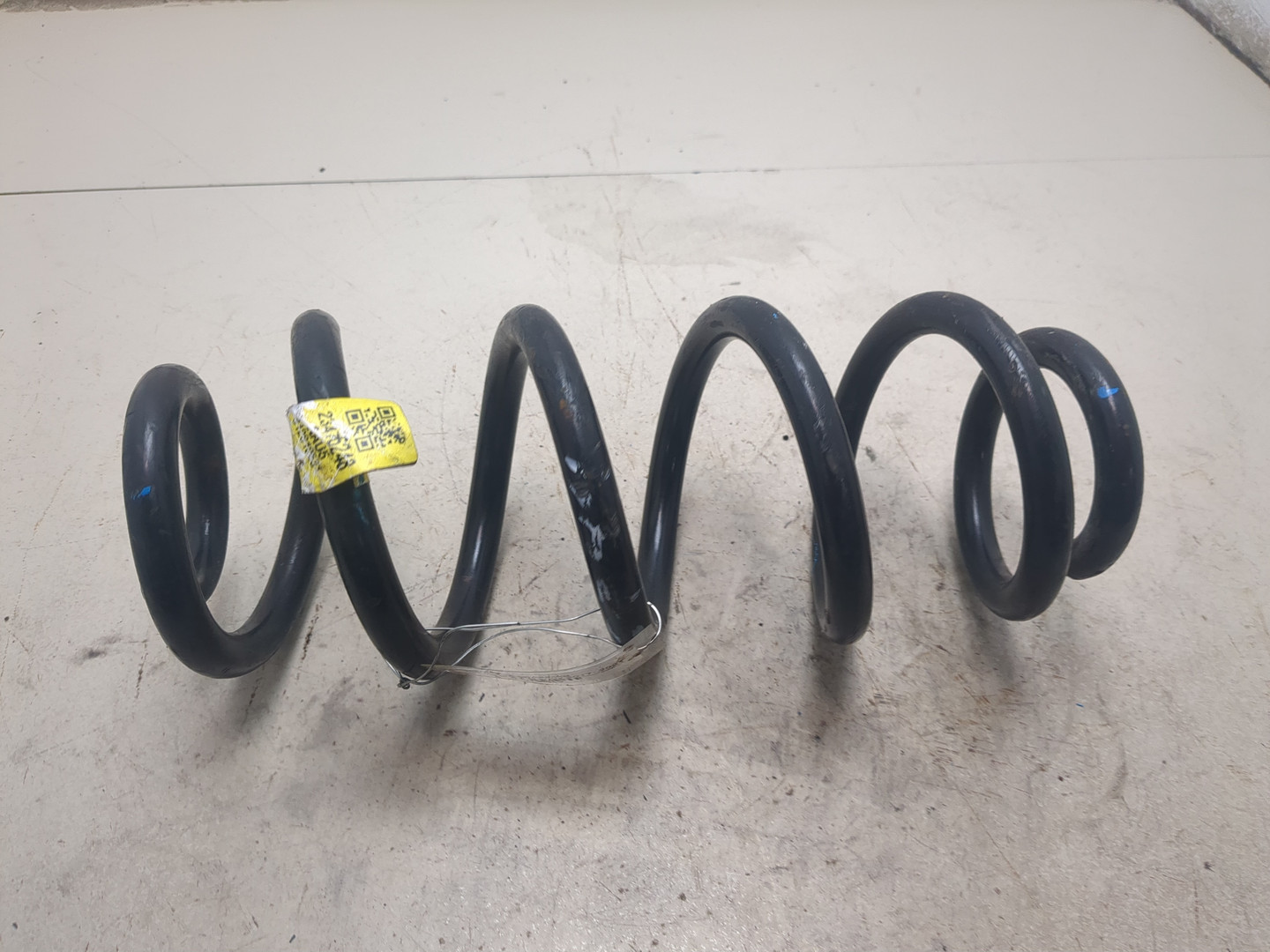 Пружина задняя