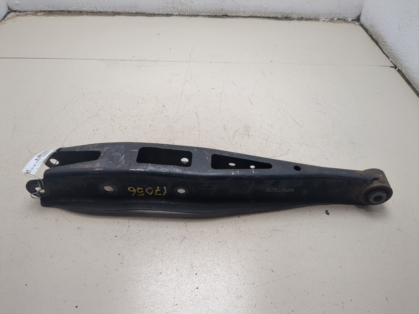 Рычаг задний левый