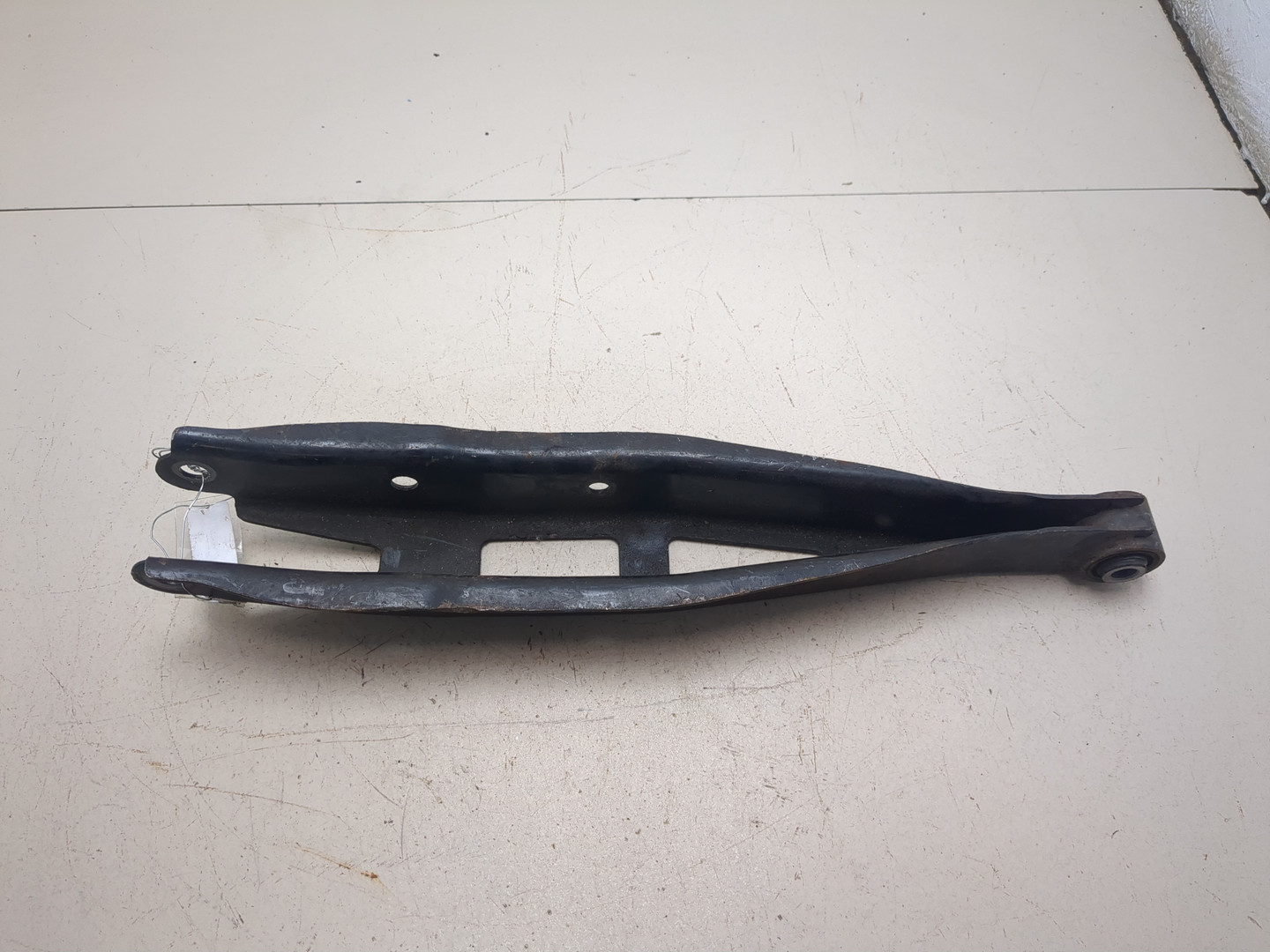 Рычаг задний левый