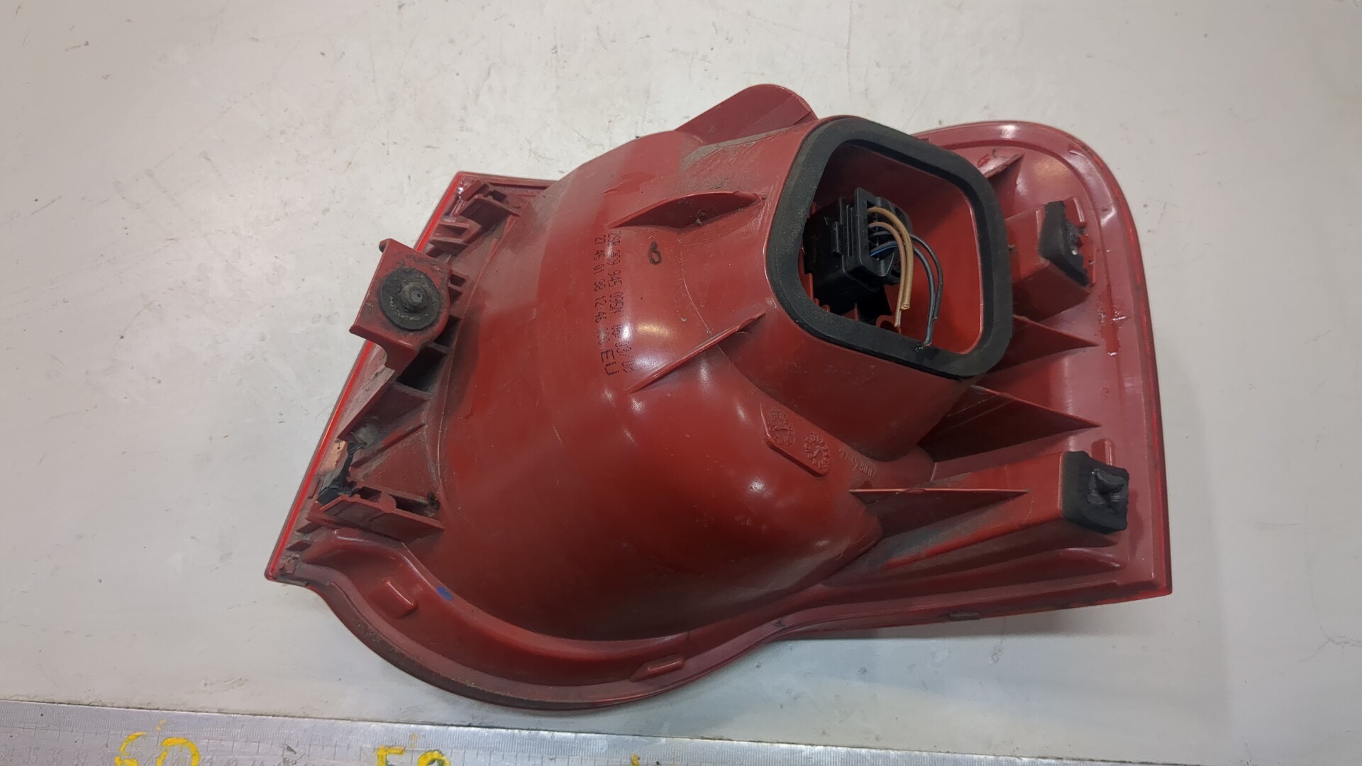 Фонарь задний левый