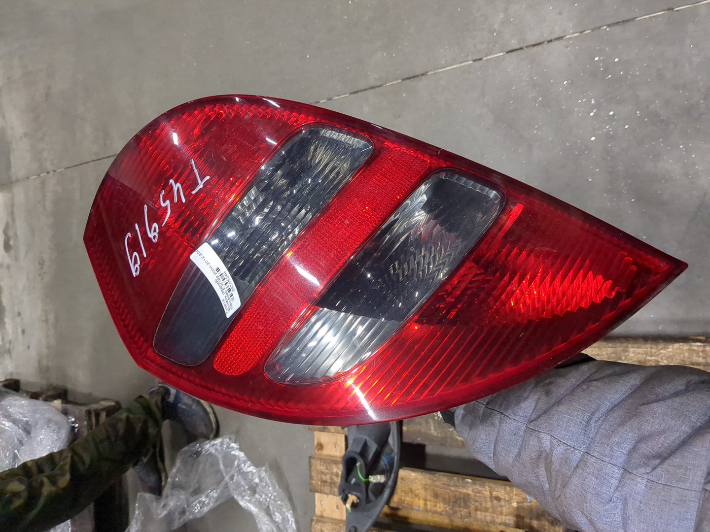 Фонарь задний левый