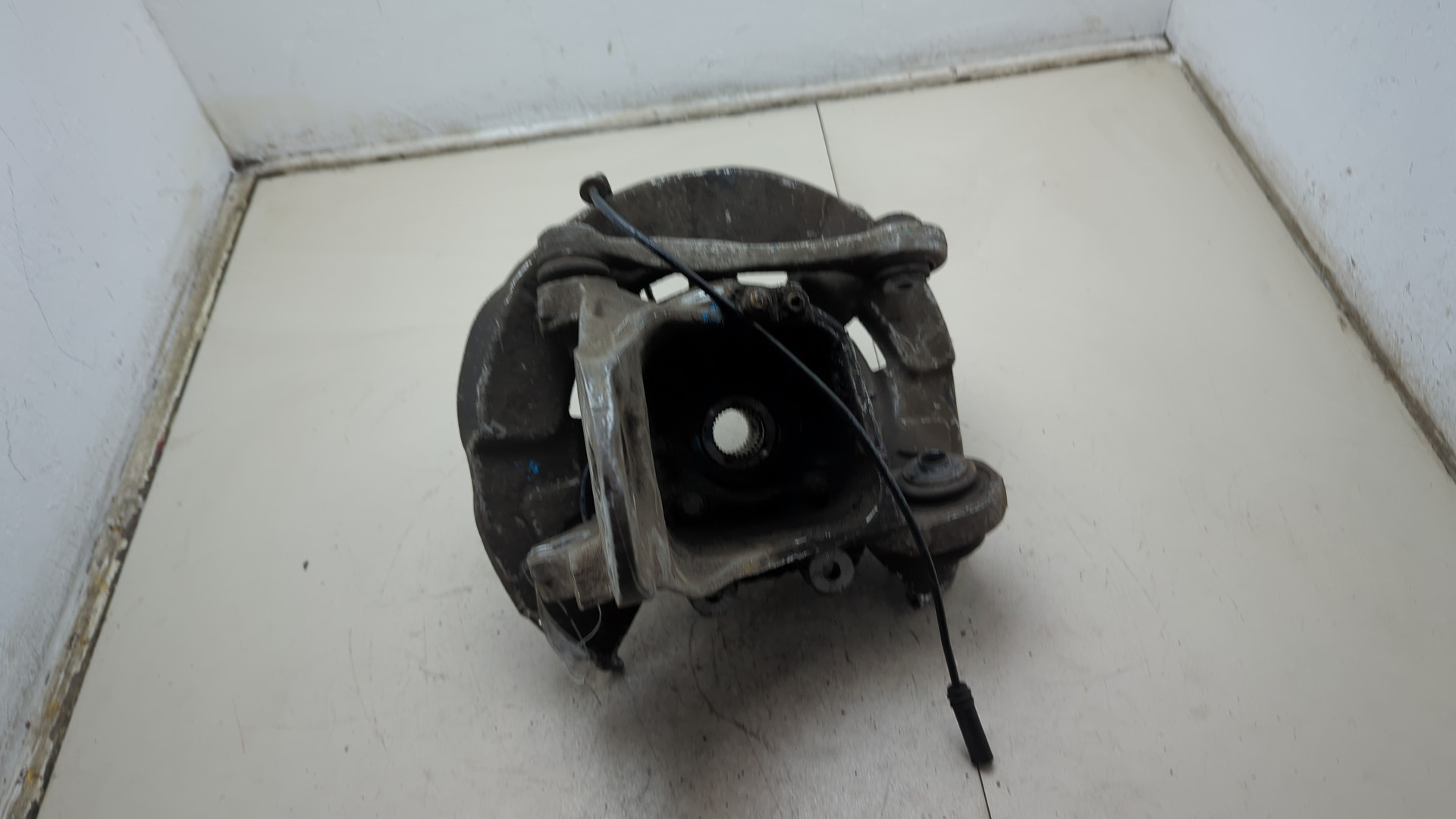 Кулак поворотный задний левый