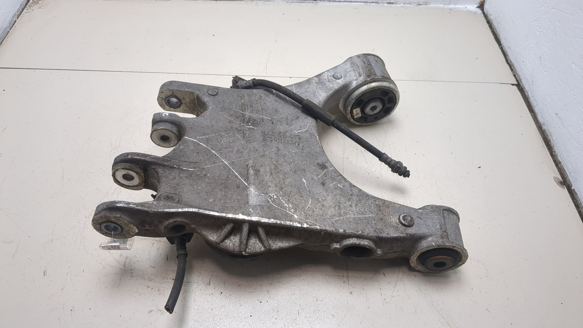 Рычаг задний правый