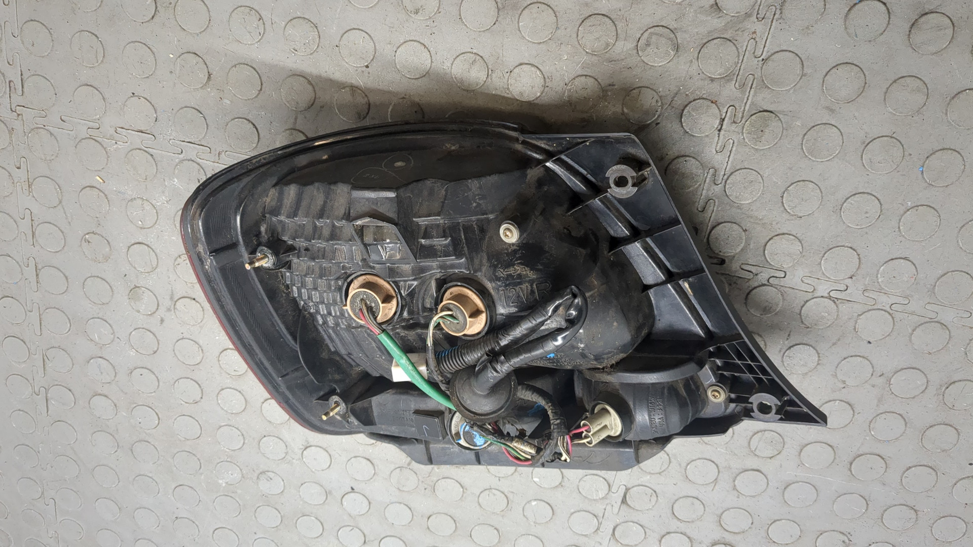 Фонарь задний левый