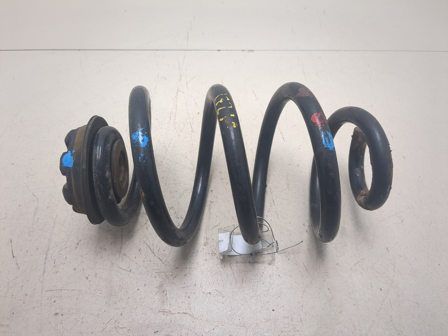 Пружина задняя