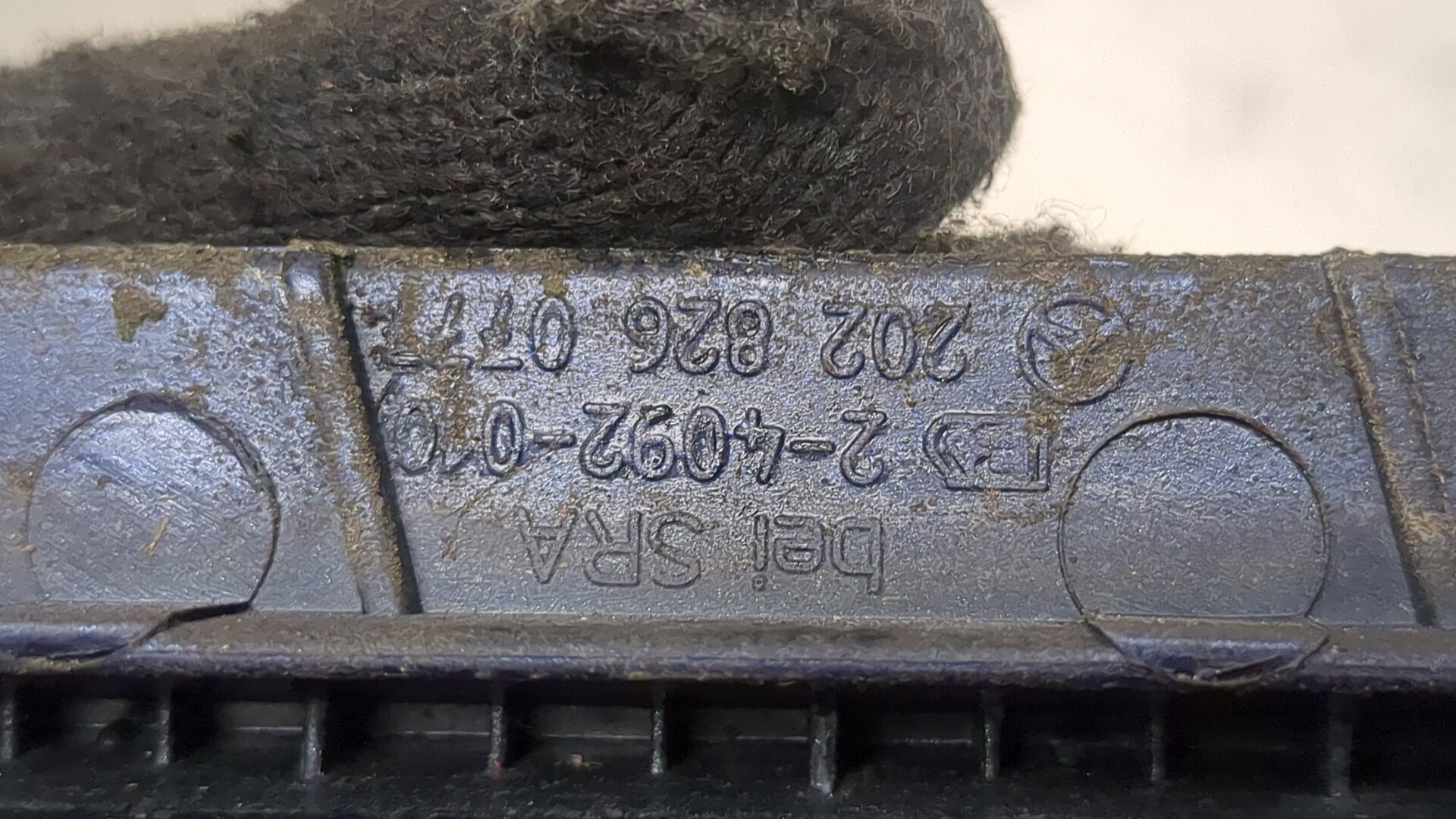 Планка под фару левая