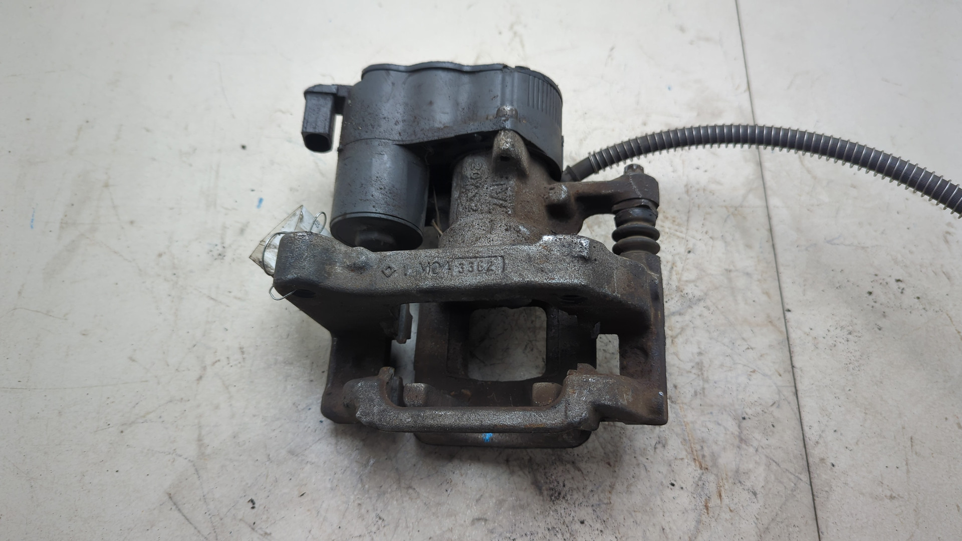 Суппорт задний левый