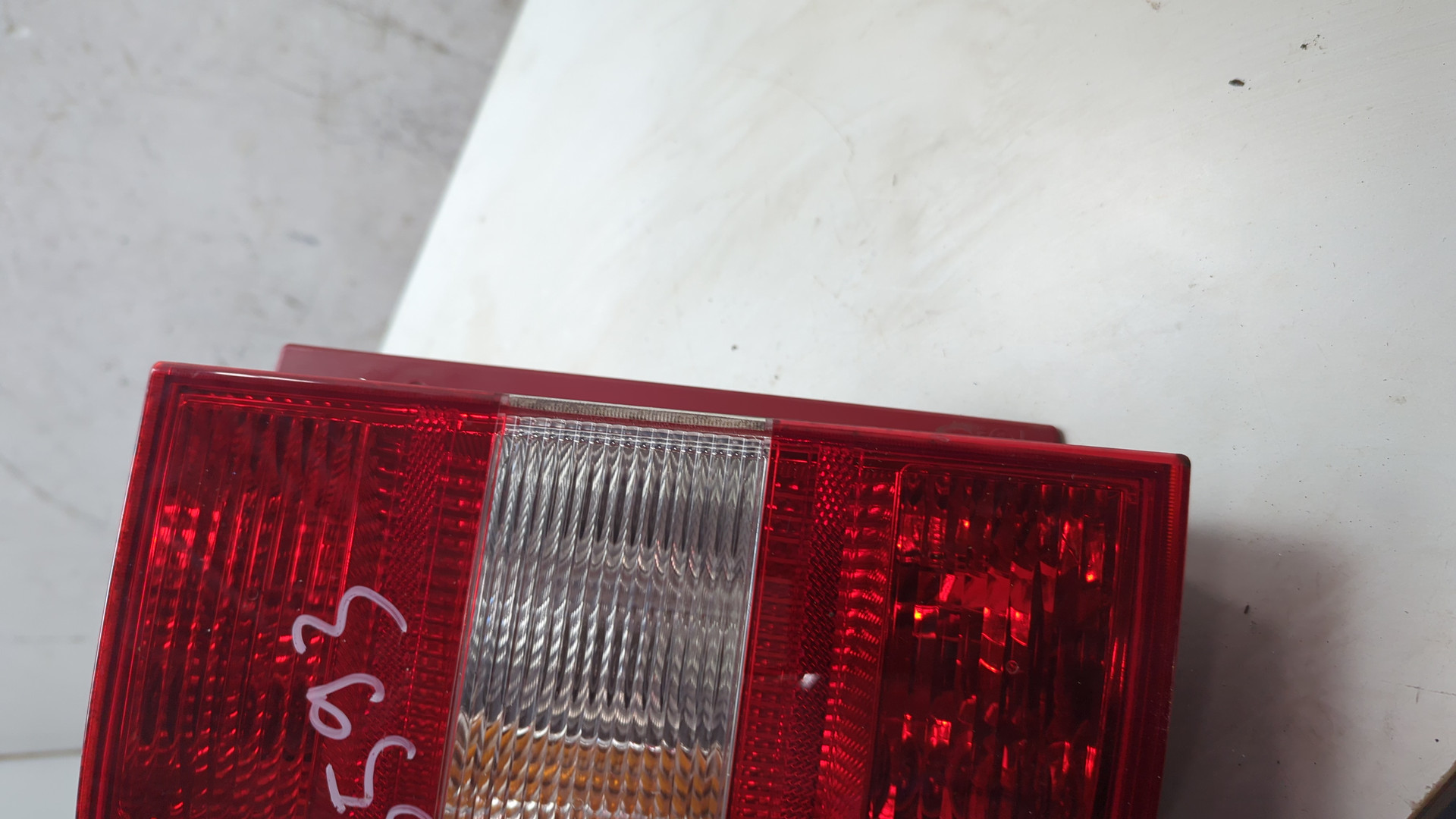 Фонарь задний левый