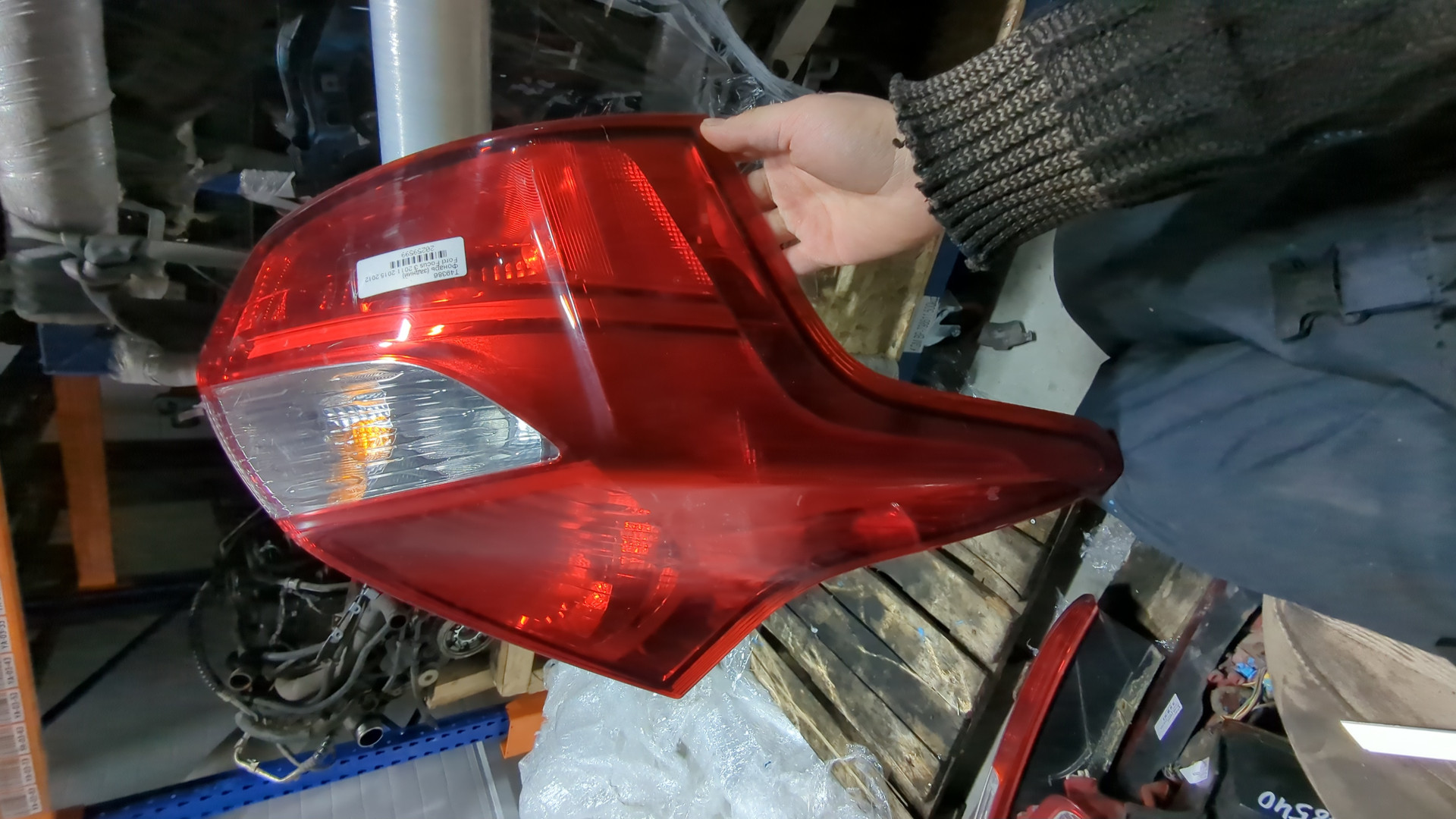 Фонарь задний левый