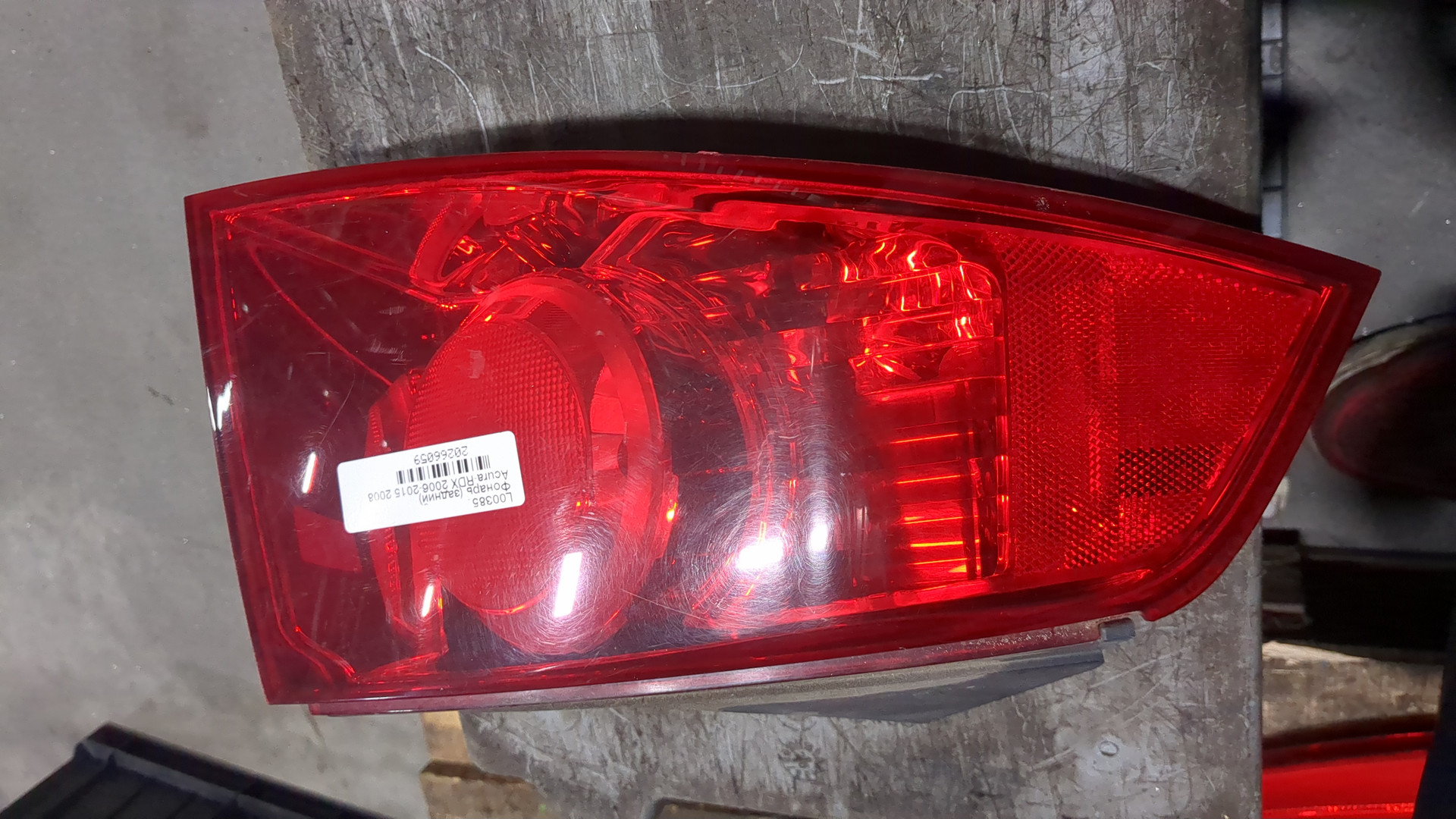 Фонарь задний левый