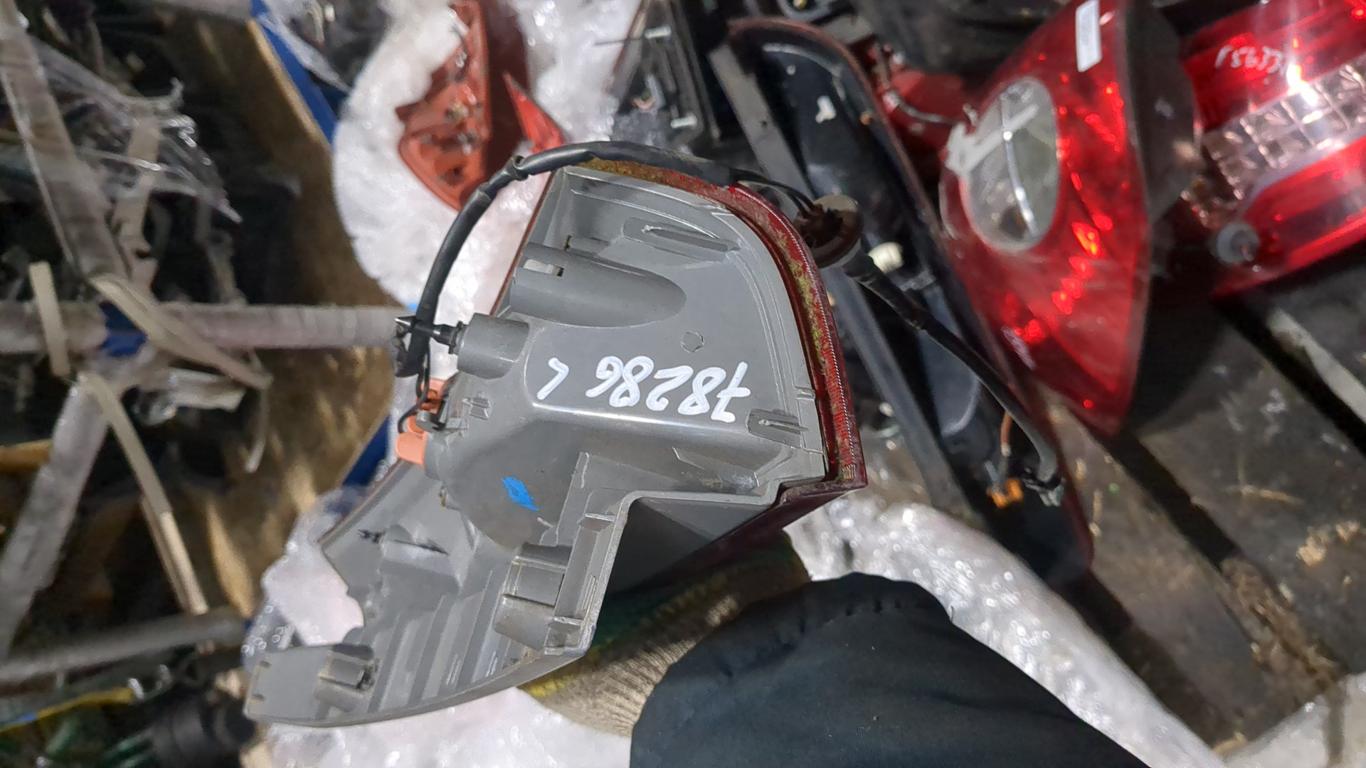 Фонарь задний левый