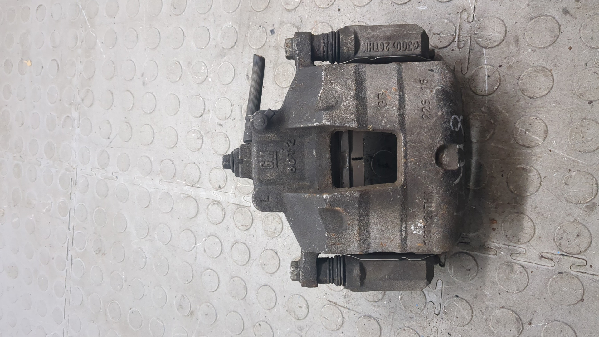 Суппорт передний левый