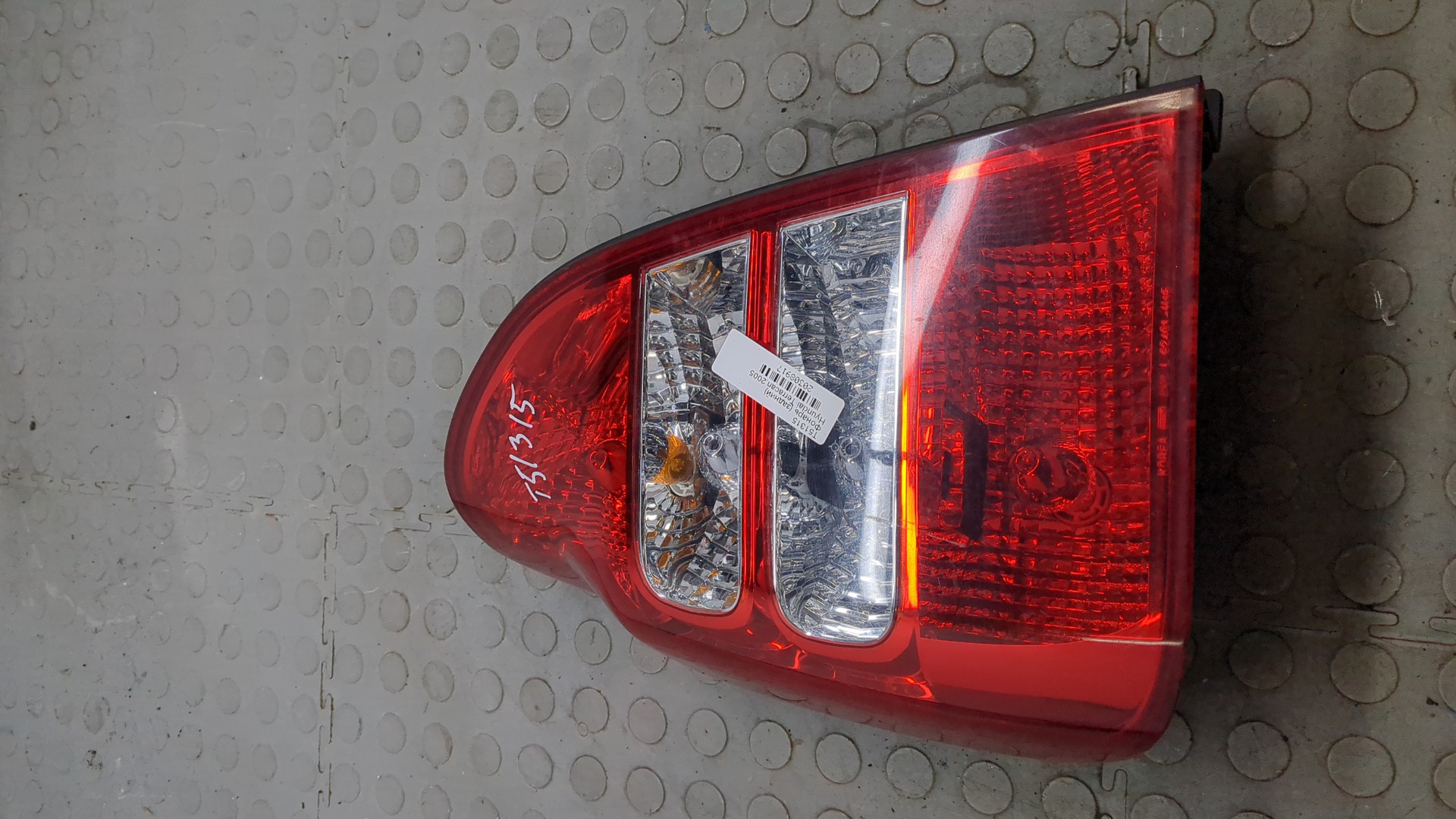 Фонарь задний левый