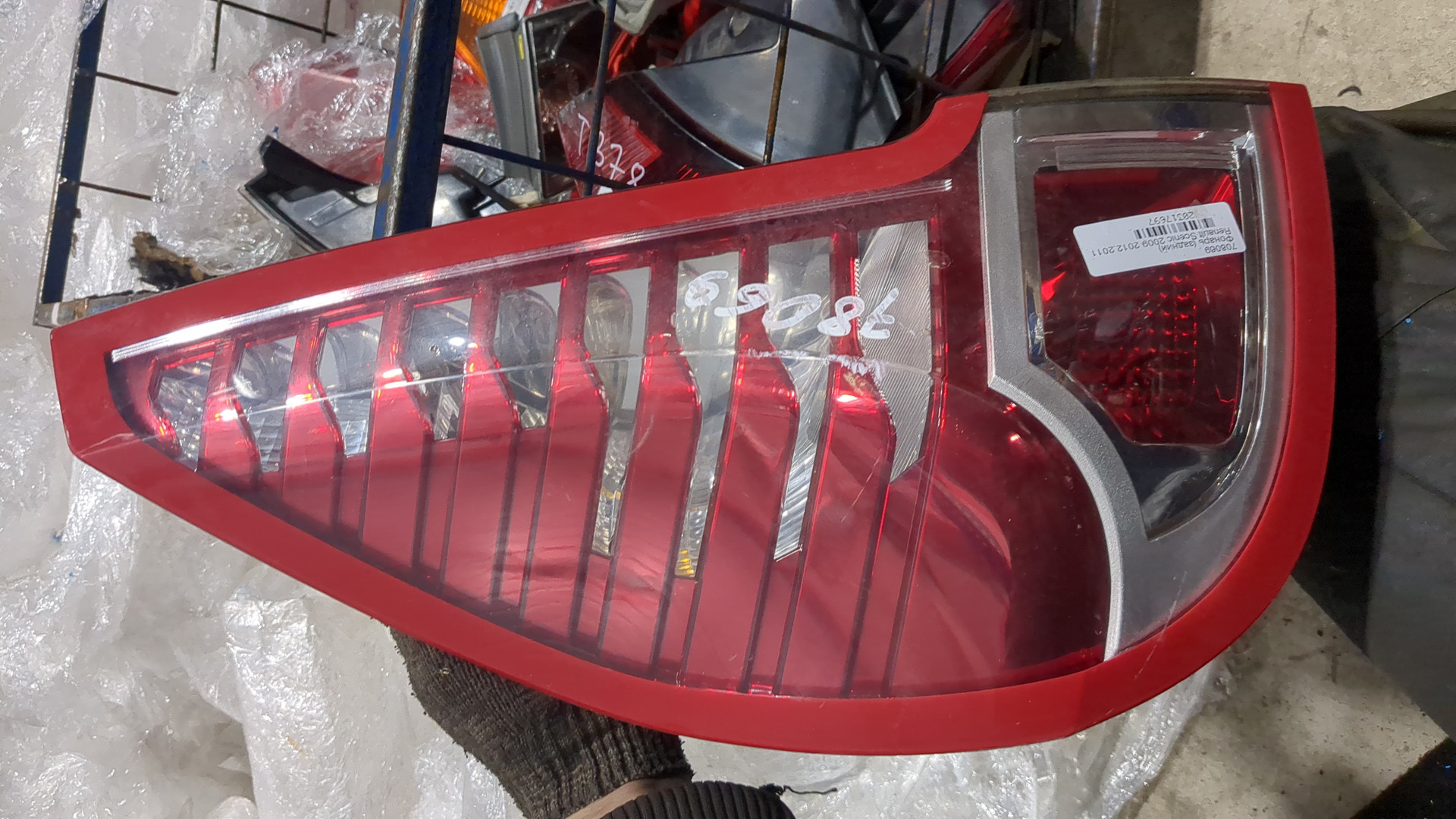 Фонарь задний левый